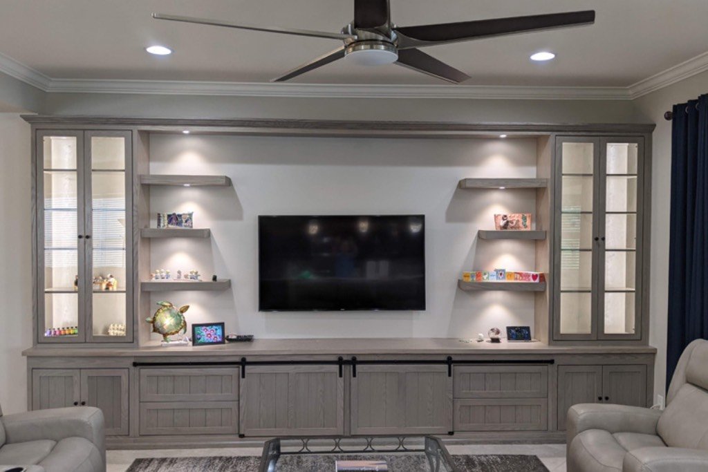 Woodworker crafting custom cabinetry for a luxury home