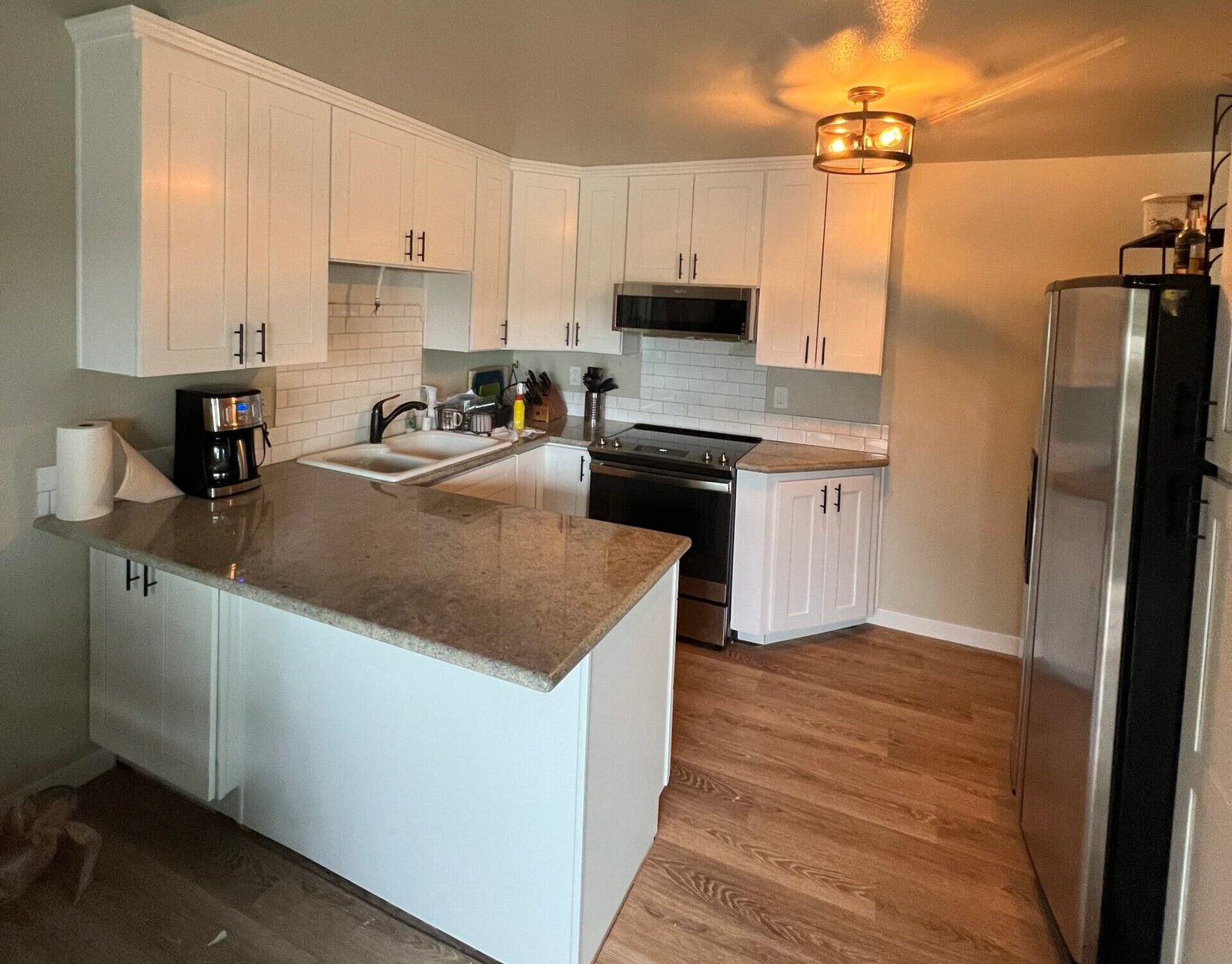 Contemporary kitchen makeover by Reza Custom