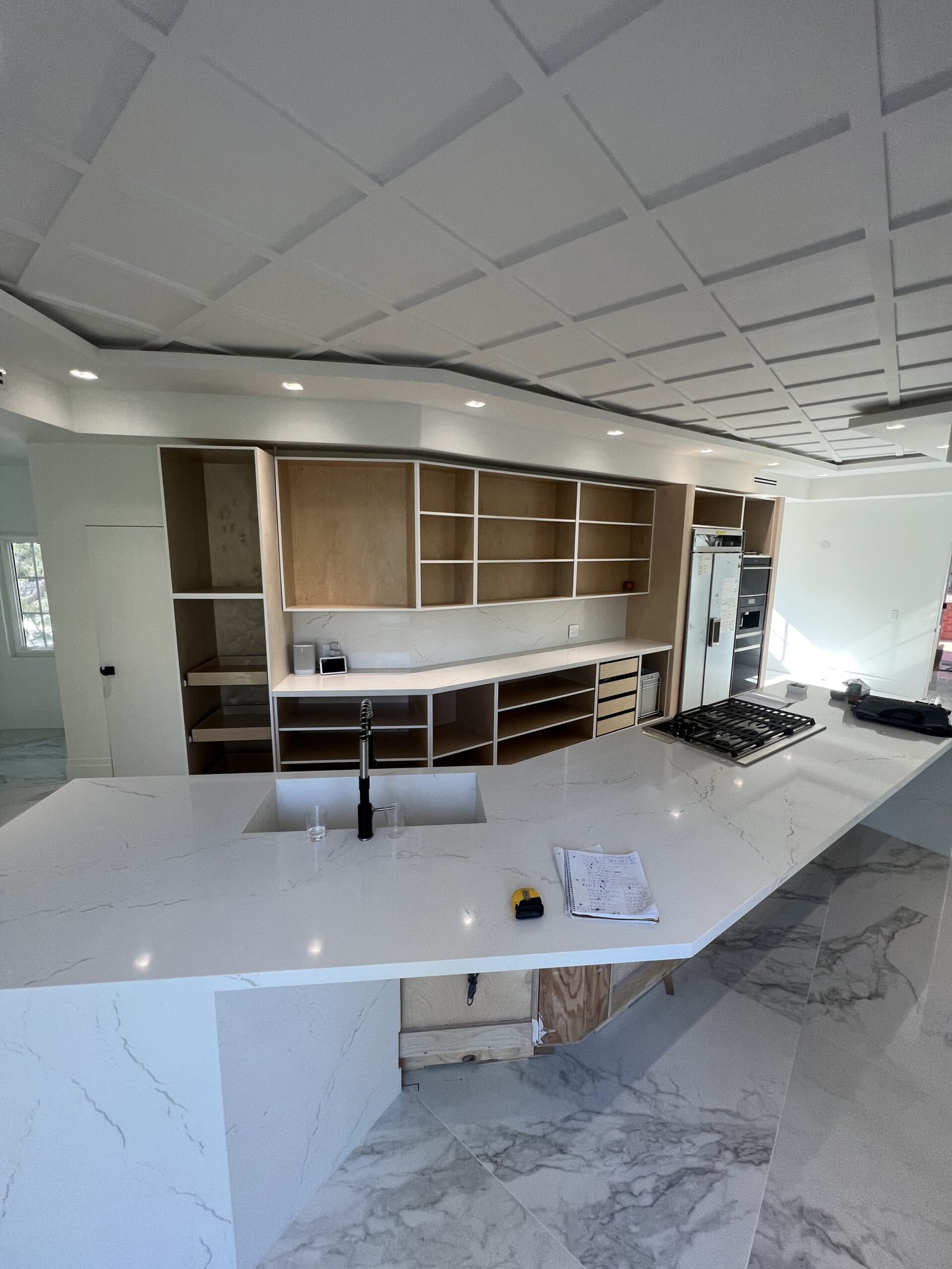 frameless flat-panel cabinets with quartz island Rancho Santa Fe