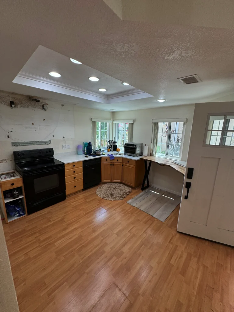 before and after kitchen remodel with white frameless cabinets La Jolla