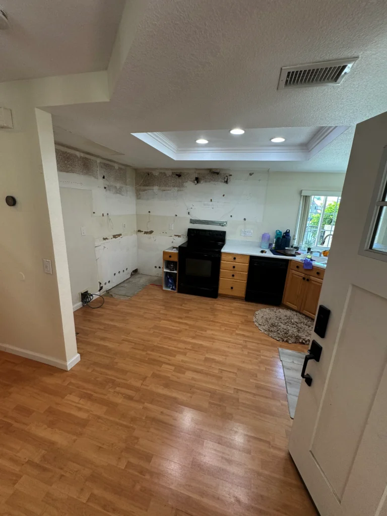 before and after kitchen remodel with white frameless cabinets La Jolla