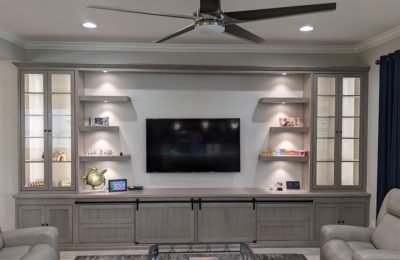 Woodworker crafting custom cabinetry for a luxury home