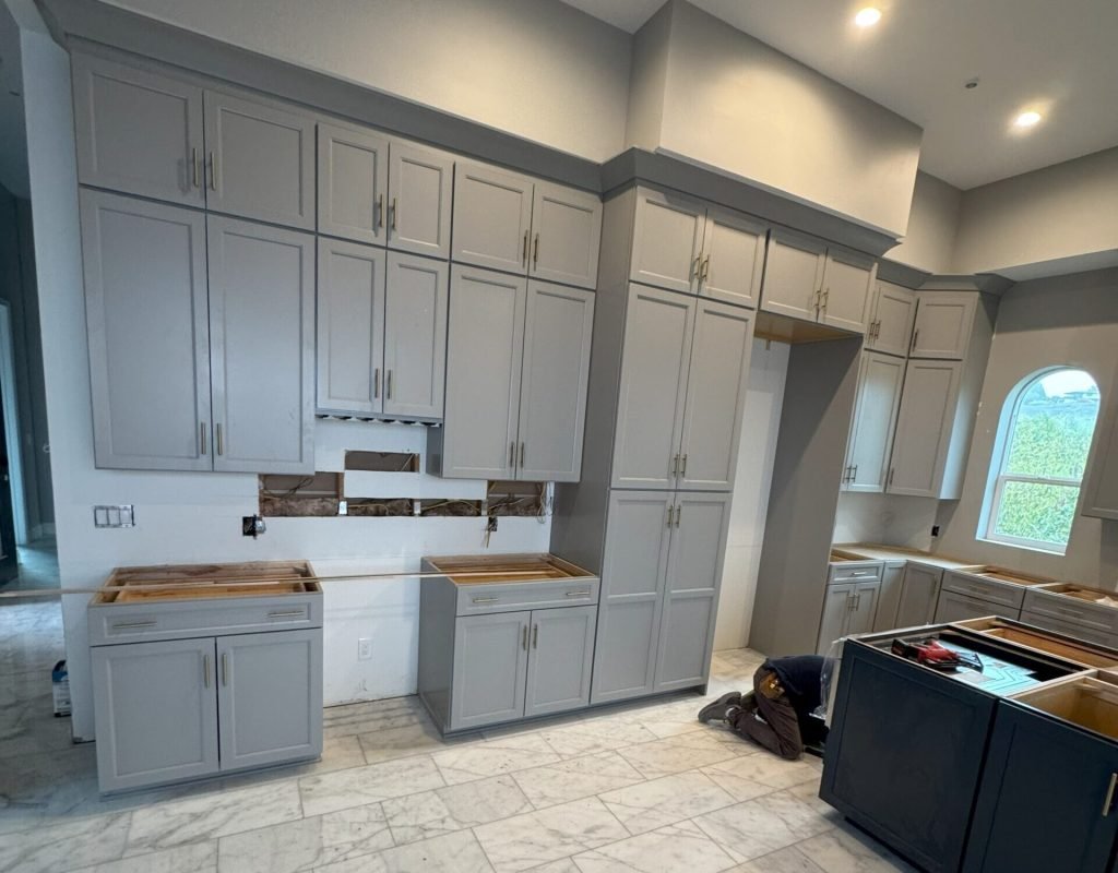 Stylish kitchen storage cabinets by Reza Custom Cabinet