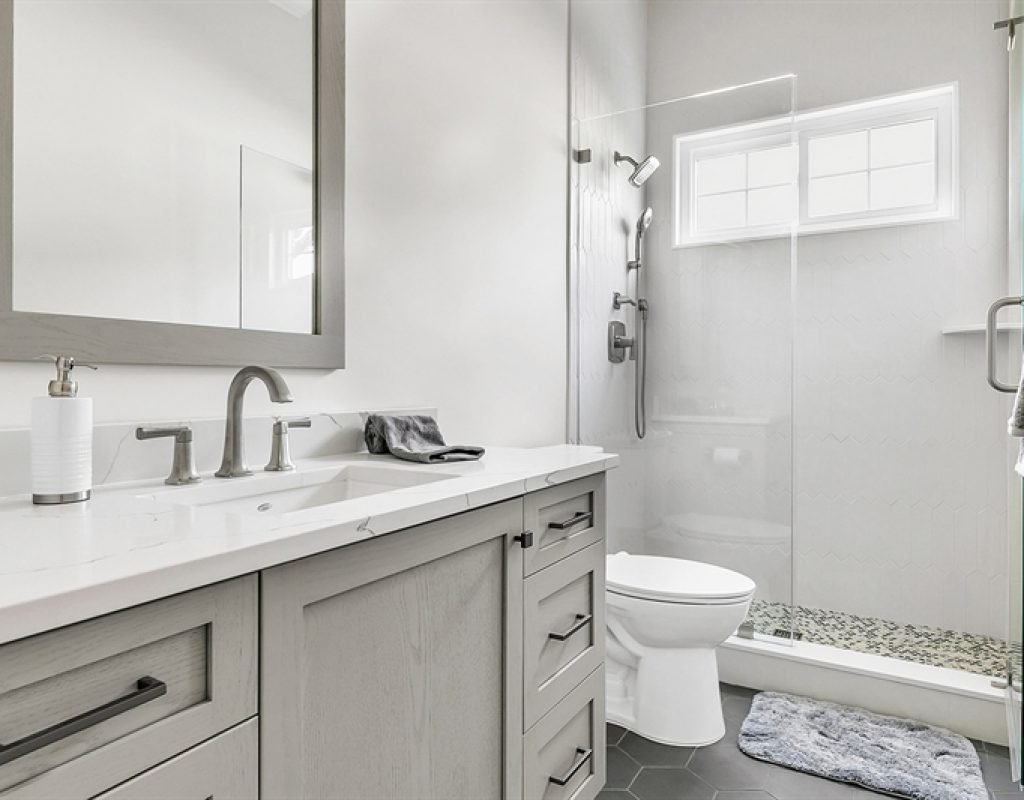 Elegant Coronado, CA bathroom with custom wood cabinet design