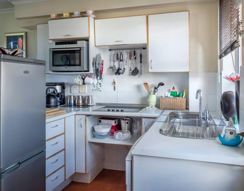 Sophisticated kitchen interior with modern appliances, wooden accents, and functional design.